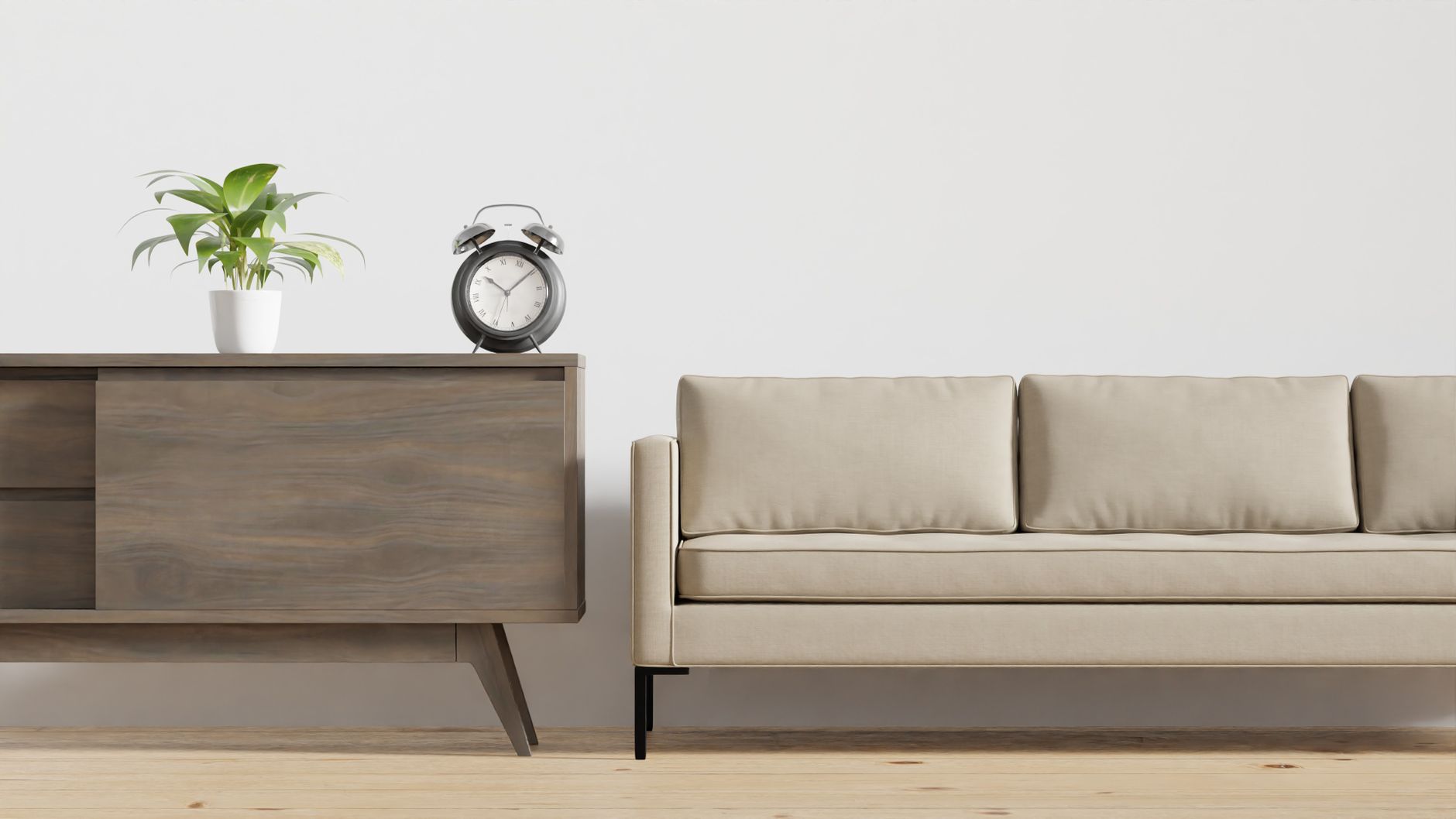 Contemporary living room showcasing a leather couch, butterfly chair, and healthy green indoor plants.