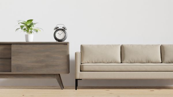 Minimalist living room with a beige sofa — photo by dada _design on Pexels