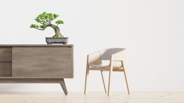 A modern minimalist interior featuring a wooden cabinet with a bonsai plant and a sleek chair, ideal for contemporary decor lovers.