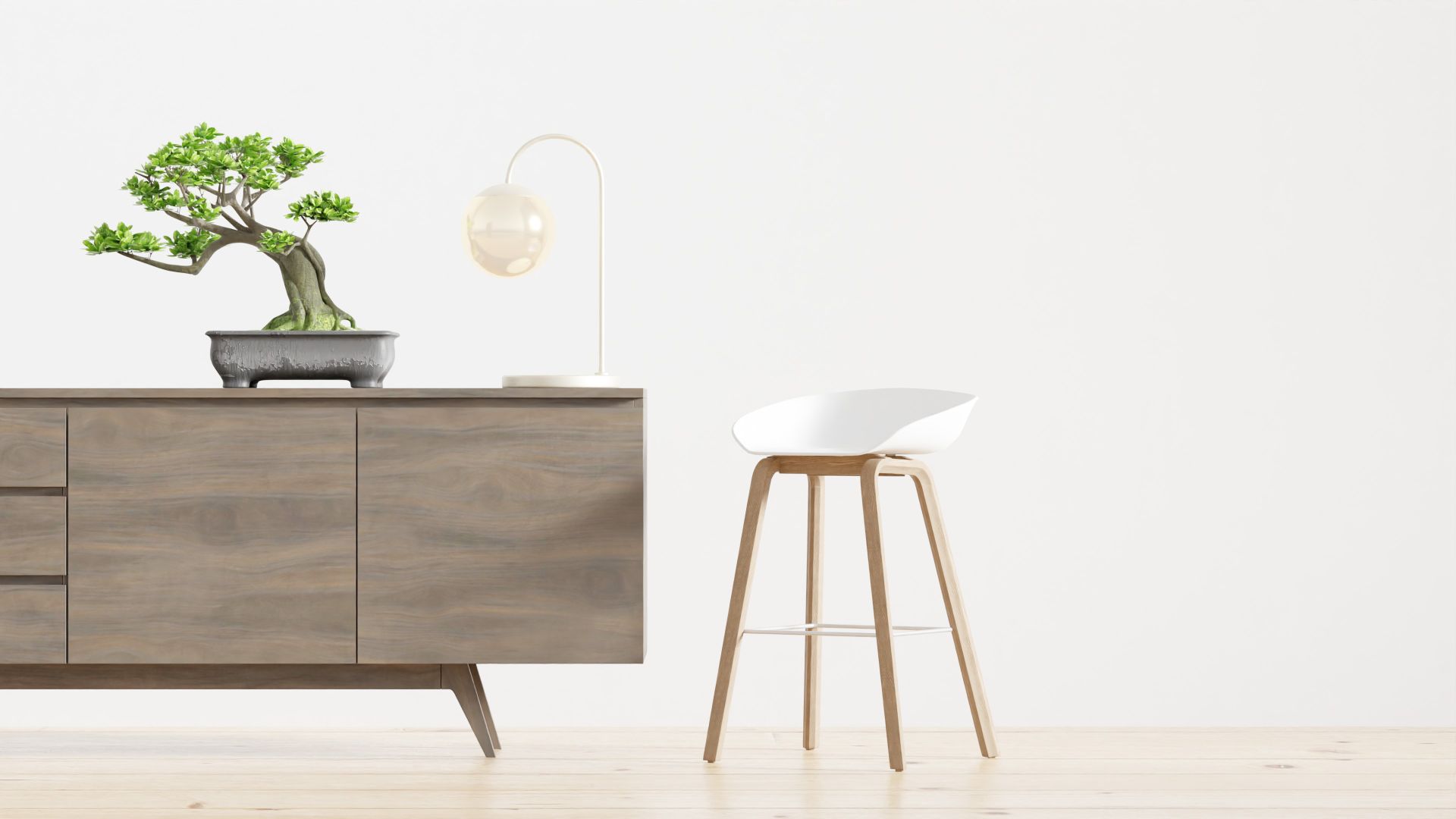 Stylish minimalist interior featuring a wooden cabinet, bonsai tree, and modern decor elements.