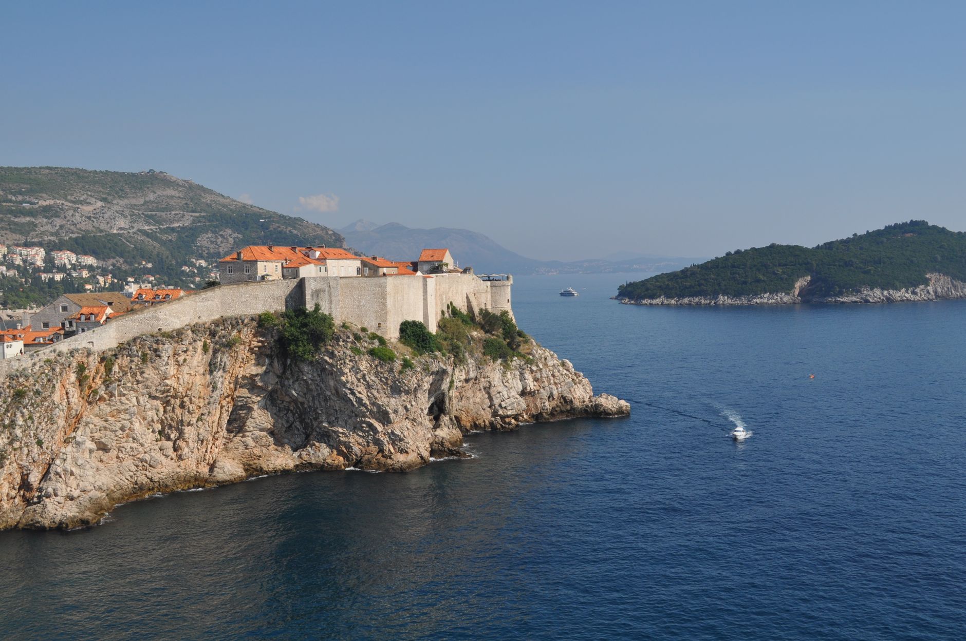 Coastal road curving above the Adriatic on the Pelješac peninsula