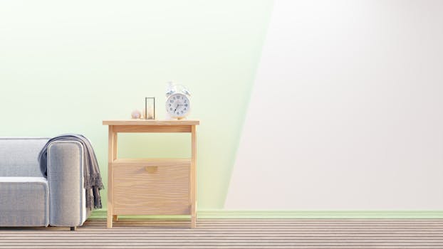 Cozy minimalist living room with wooden furniture and a clock on the side table.