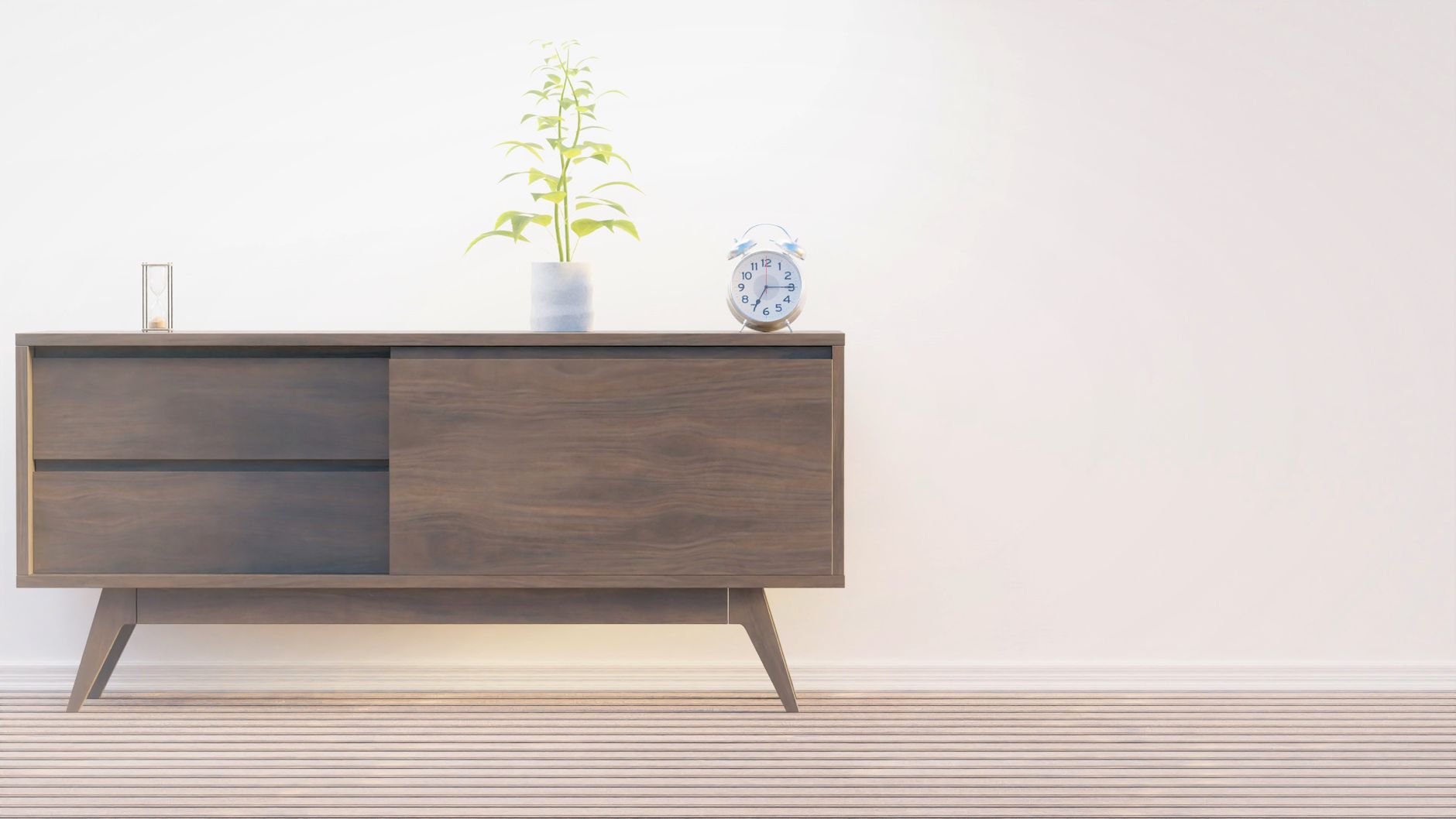 Modern ve minimalist bir odada yer alan, ince hatlara ve yerden yüksek ayaklara sahip estetik ahşap mobilyalar.