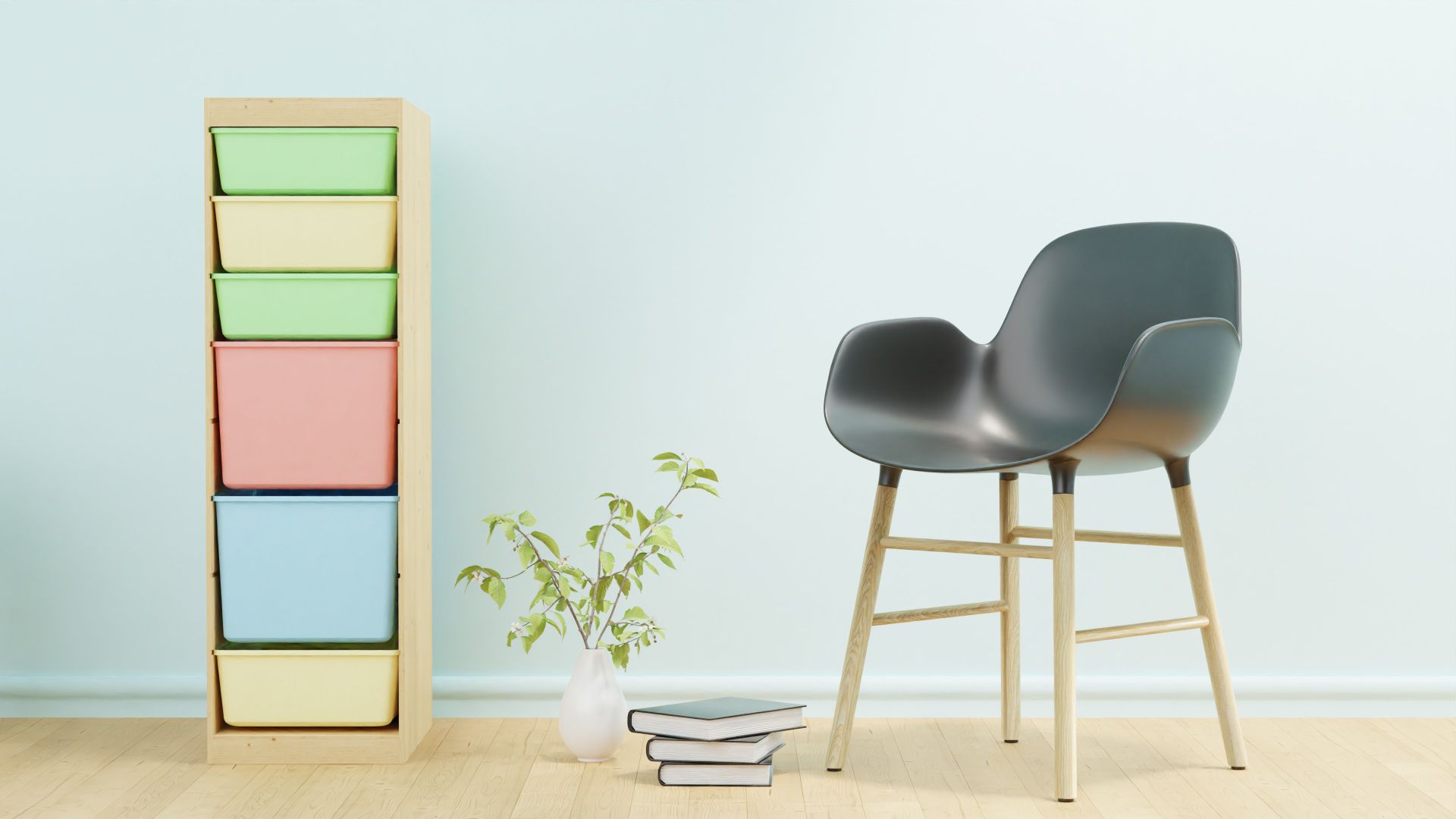 Modern minimalist interior featuring a stylish chair and a colorful storage unit.