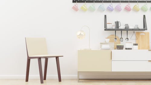 White Wooden Table Near White Wall