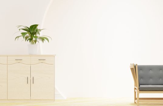 Bright minimalist interior featuring a wooden cabinet and potted plant for serene decor.