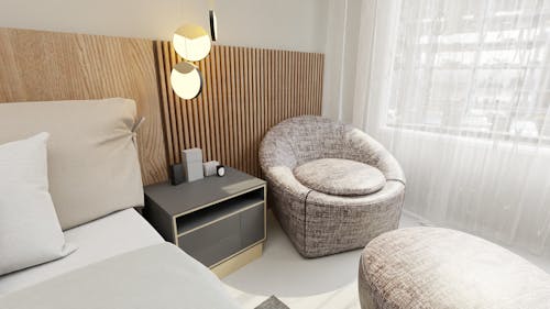 Foto profissional grátis de cadeira de sofá, cama, dormitório