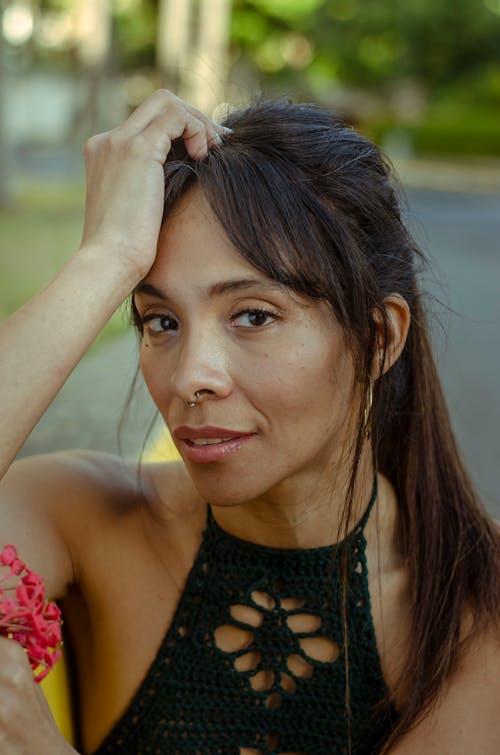 Close-Up Shot of a Woman in Black Top