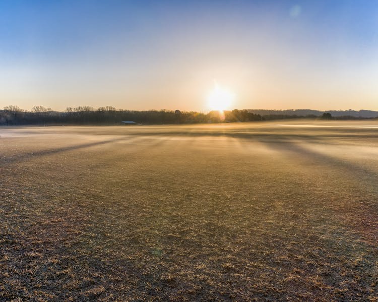 Countryside Field At Foggy Autumn Sunrise