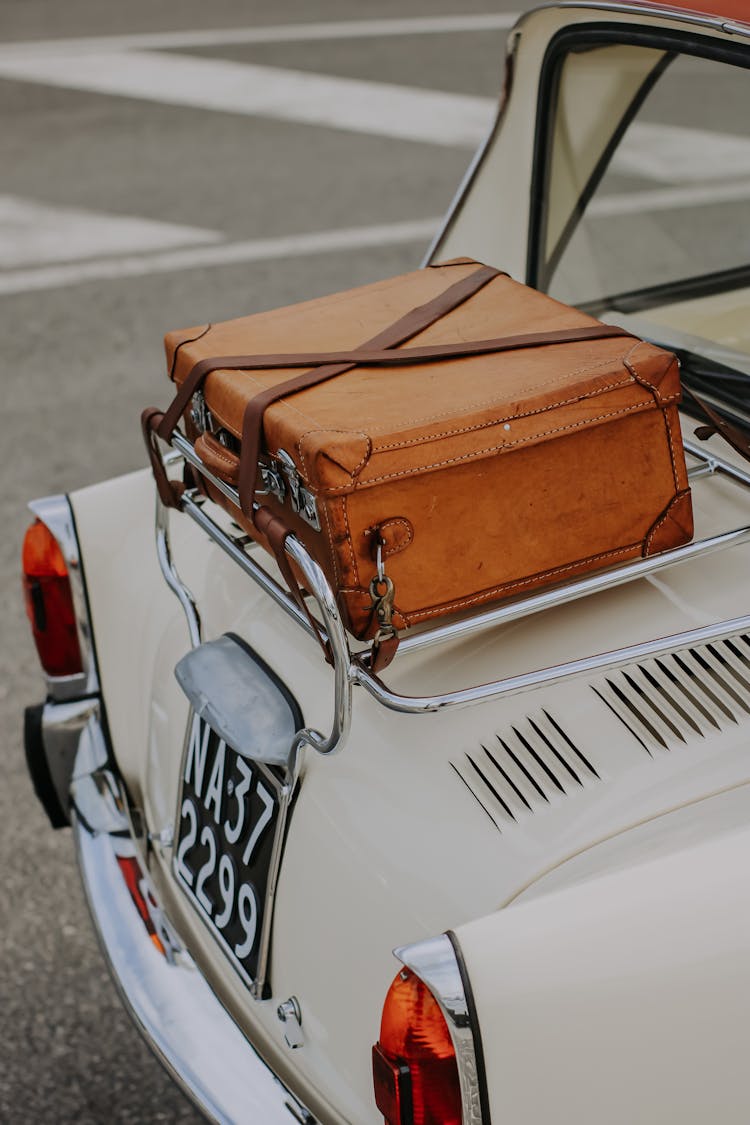 Close Up Of Suitcase On Car