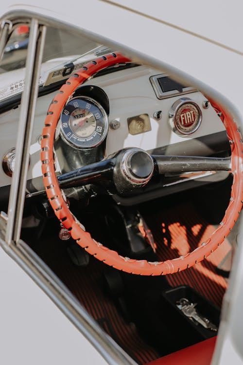Close-Up Shot of a Red Steering Wheel
