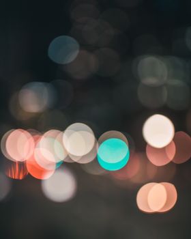 Blurred bokeh lights creating an abstract urban night scene in Toronto, Canada.