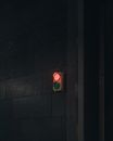 Flashing Red Light on the Wall