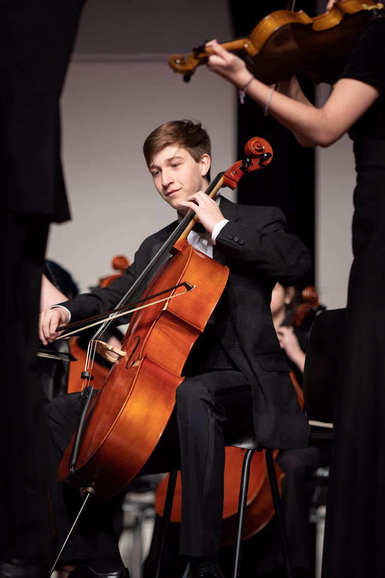 Man In An Orchestra Playing The Cello 