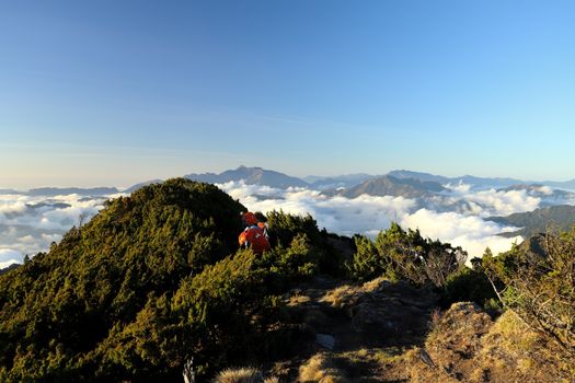 Breathtaking view of Taiwan's mountains with clouds and greenery.