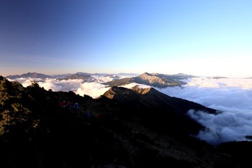 grátis Foto profissional grátis de acima das nuvens, beleza, cadeia de montanhas Foto profissional