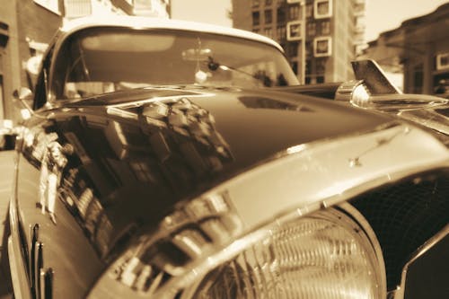 Free stock photo of cars, close up view, mirror image