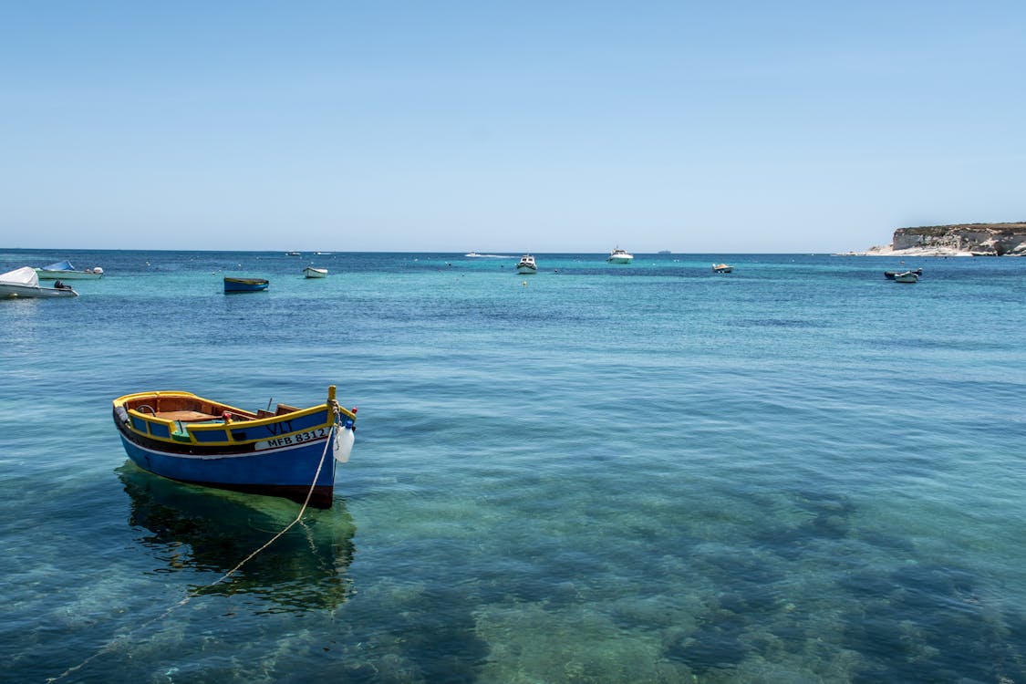 Fishing Boat Docked on Sea