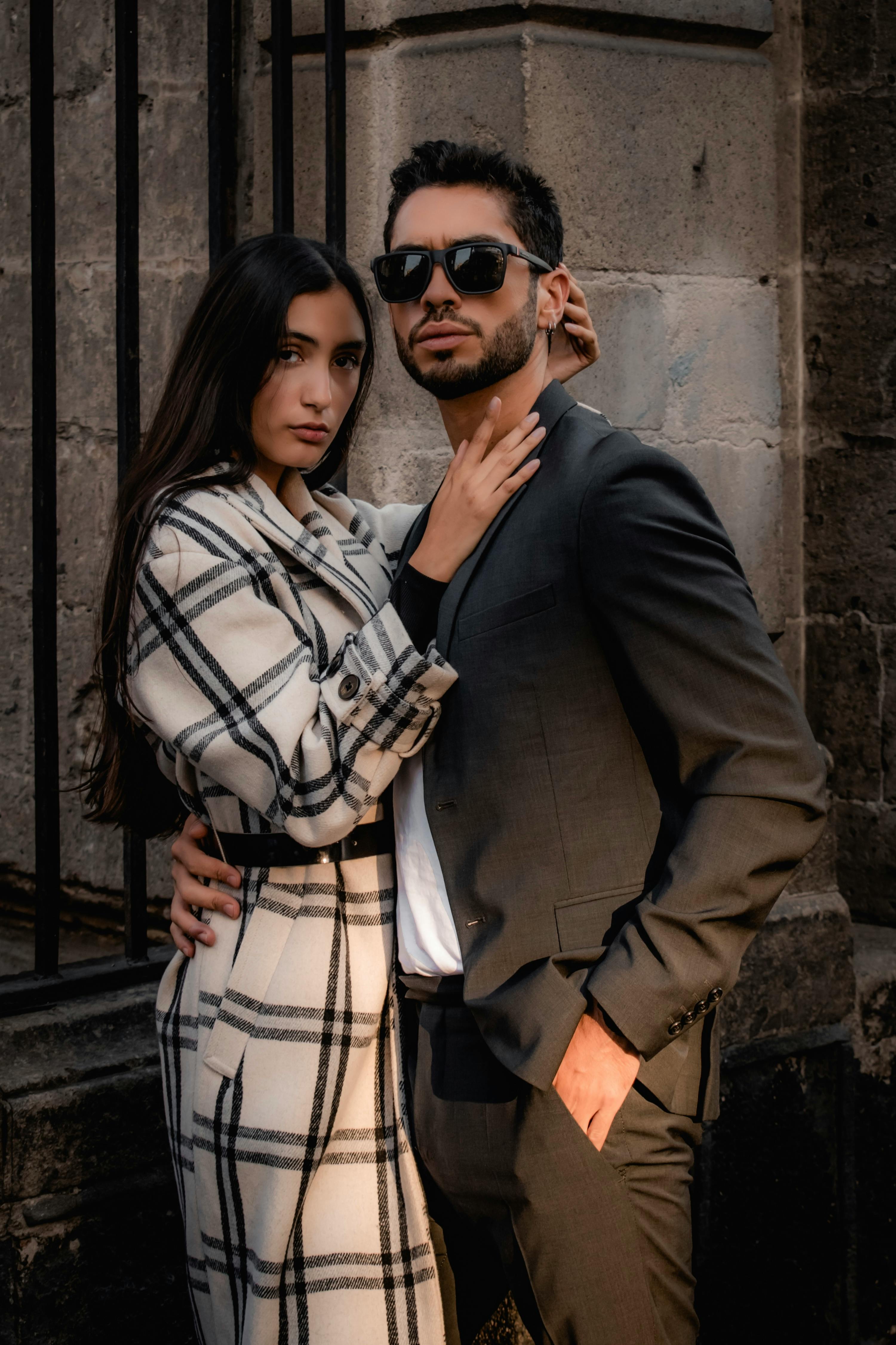 Fashion Couple Posing In Studio Stock Photo, Picture and Royalty Free  Image. Image 10933249.