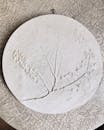 Round Gray Concrete With Heart Shaped Drawing