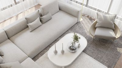 Bright living room with a pale sectional sofa, photo by dada _design on Pexels