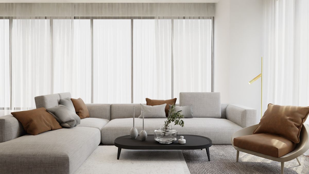 Cream contemporary sofa in a warm minimalist room