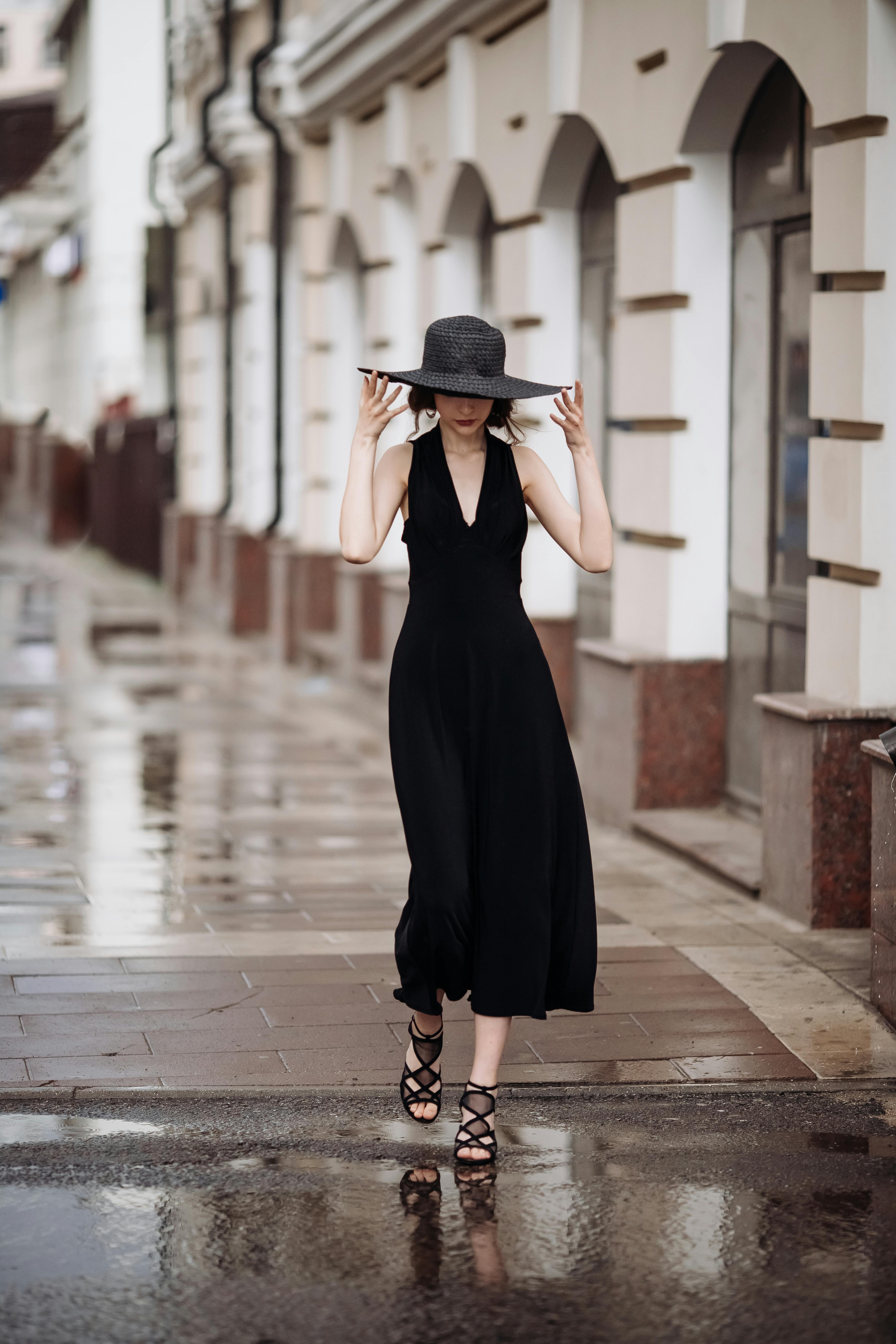 woman walking on pavement