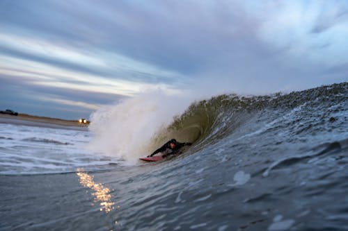 Man Surfing on Sea Waves