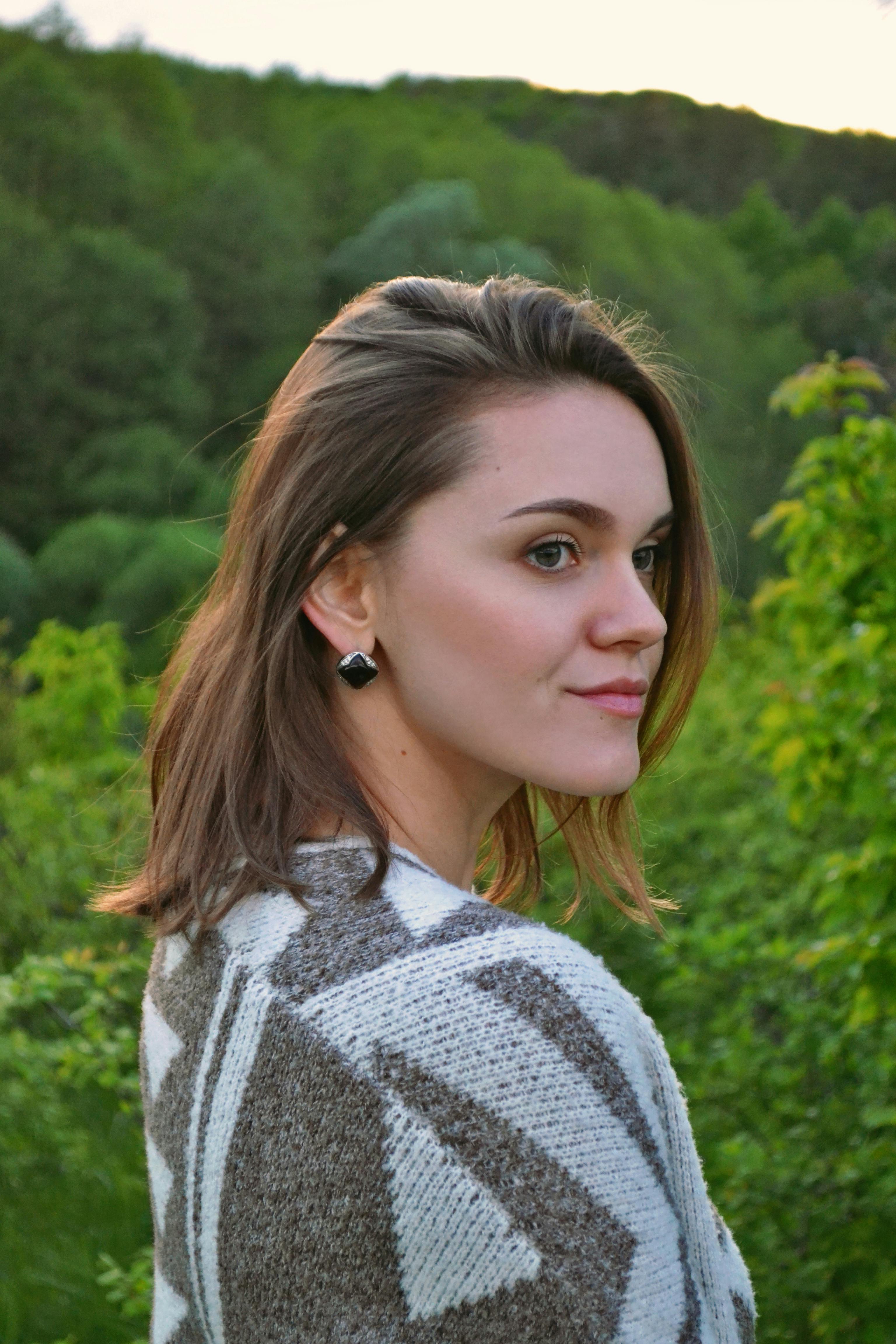 Back View Shot of a Woman Jumping on the Beach · Free Stock Photo