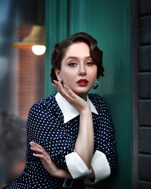 Portrait of a Beautiful Woman in Retro Outfit