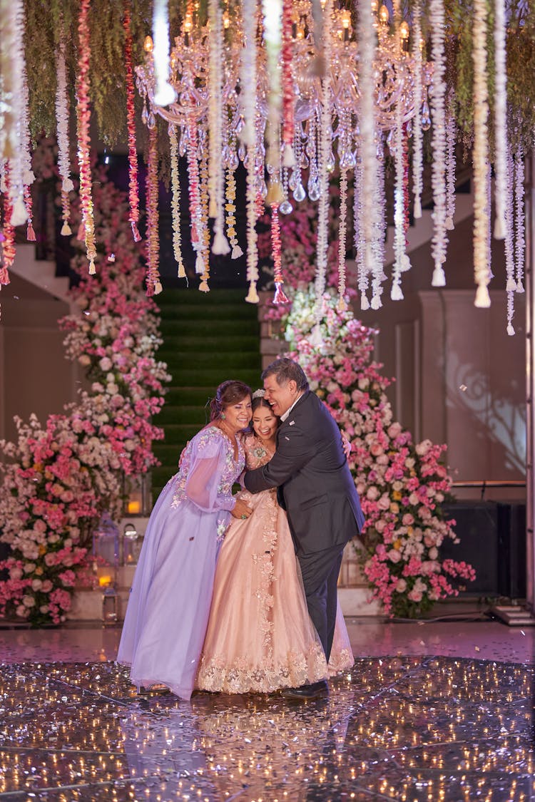 Parents With Daughter At 15th Birthday Party