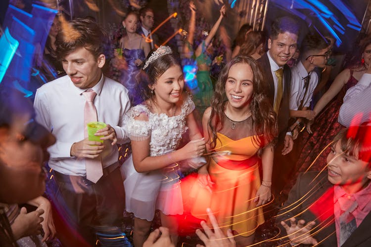 Teenagers Having Fun On Senior Prom Night