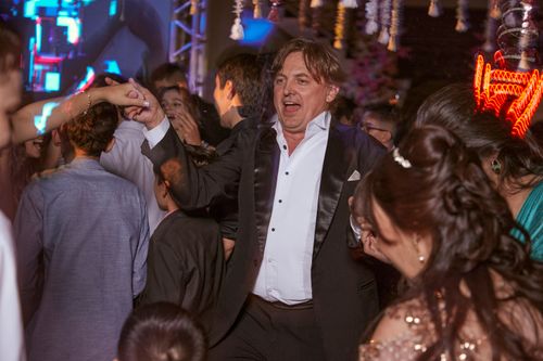 Free Energetic party scene with people dancing and enjoying at a nightclub. Stock Photo