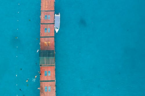 Boat by Pier in Exotic Sea