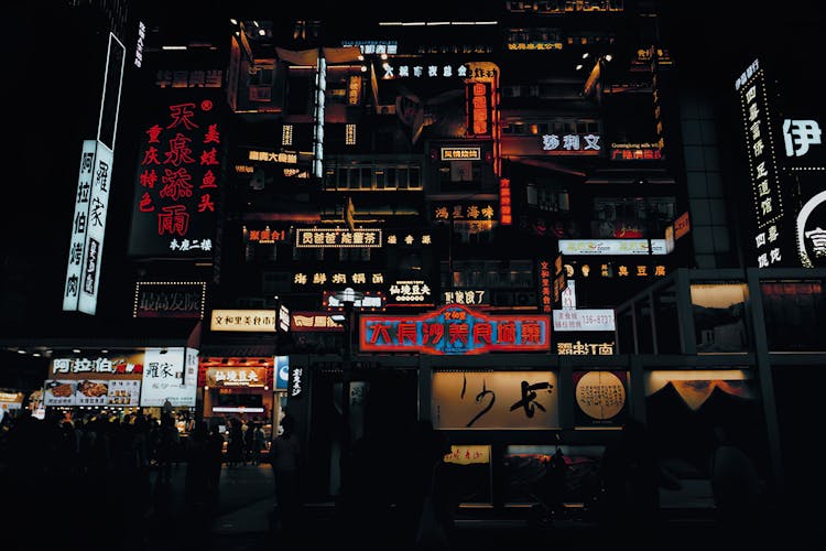 Neons And Signs In City At Night