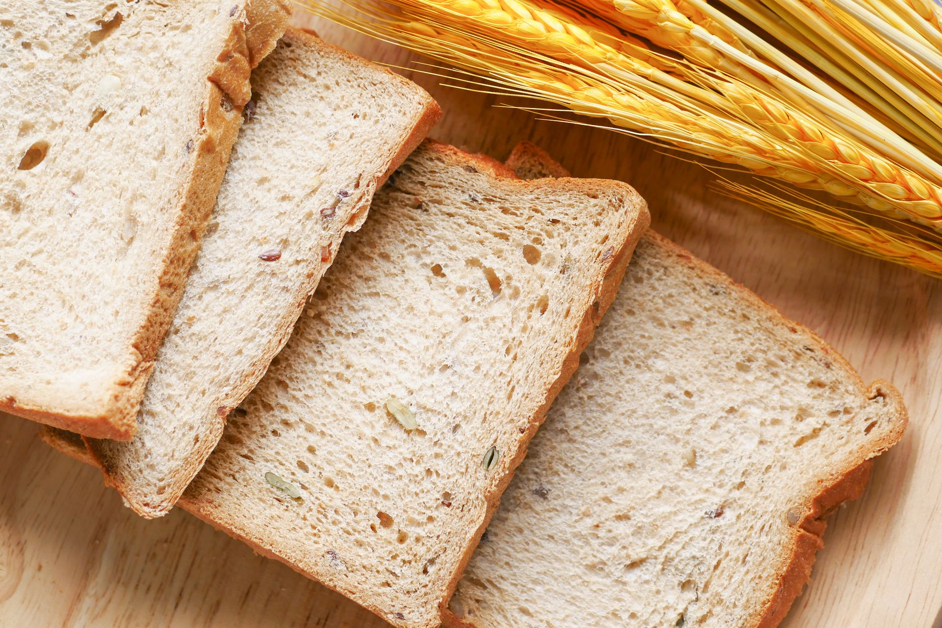 Fresh wheat bread loaf with seeds on top