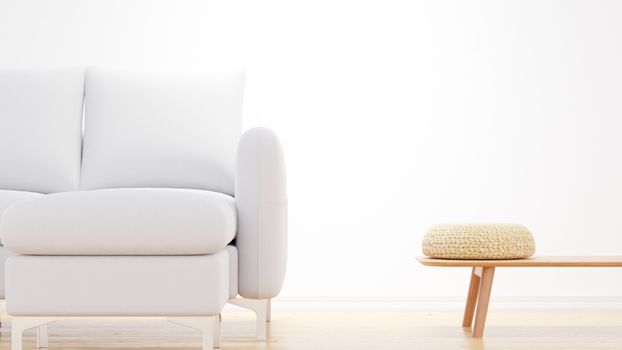 A serene minimalist living room featuring a white sofa and a wooden bench with a woven cushion, perfect for modern interiors.