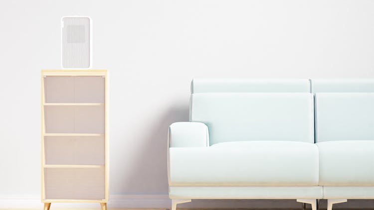 A White Sofa Beside A Side Table