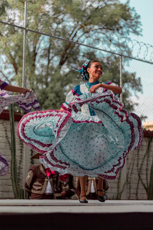 Woman Dancing During Traditional Mexican Festival 