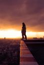 Person on Edge of Roof