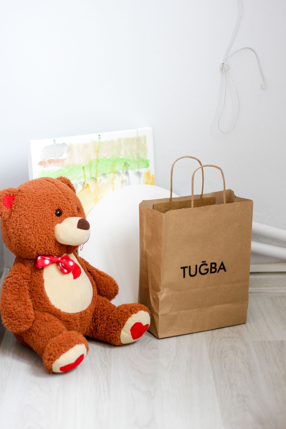Teddy bear with a paper bag gift