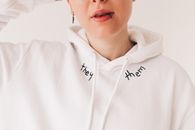 Woman in White Hoodie Taking Selfie