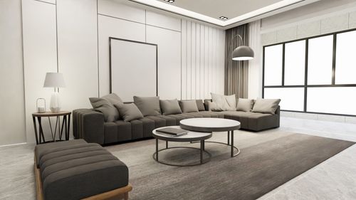 Free A stylish and cozy living room with modern furniture and neutral tones. Stock Photo