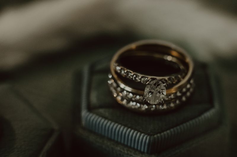 Close-up of a dazzling diamond ring set on a luxurious velvet box