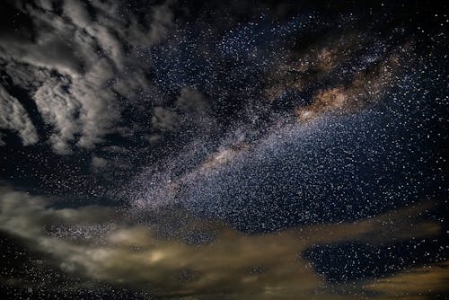 Free Stars and Clouds at Nighttime Stock Photo