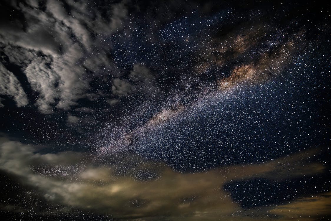Free Stars and Clouds at Nighttime Stock Photo