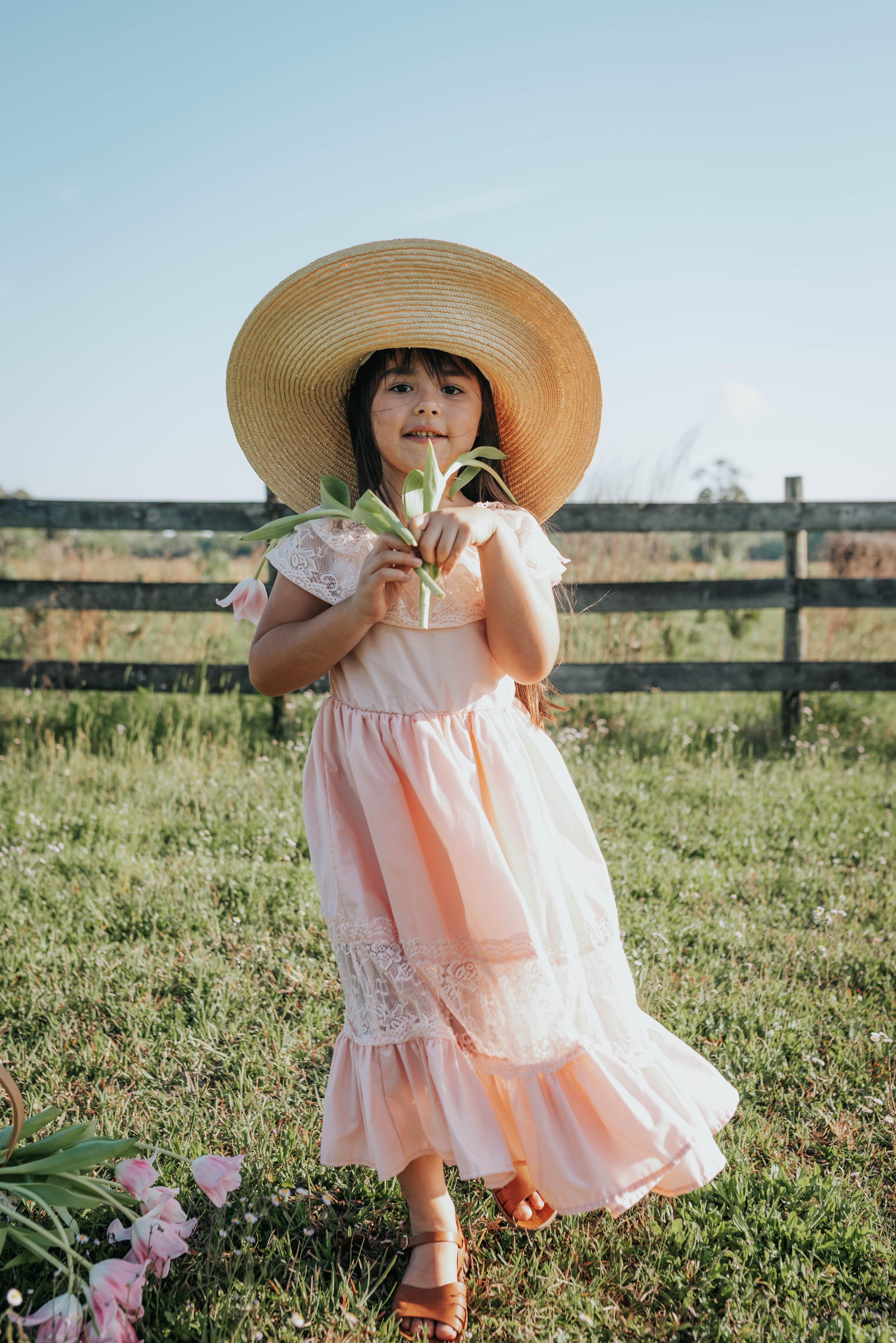 Girl Wearing Straw Hat and Dress on Meadow · Free Stock Photo