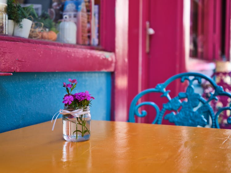 Purple Flowers On The Table