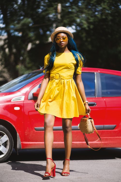 Woman Wearing Yellow Boat-neck Short-sleeved Dress Standing Near Red Car · Free Stock Photo