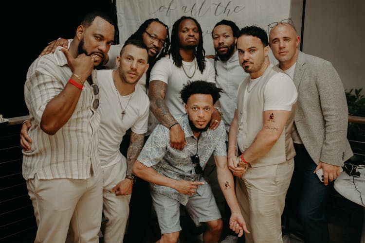 Group Of Men Posing For A Photo